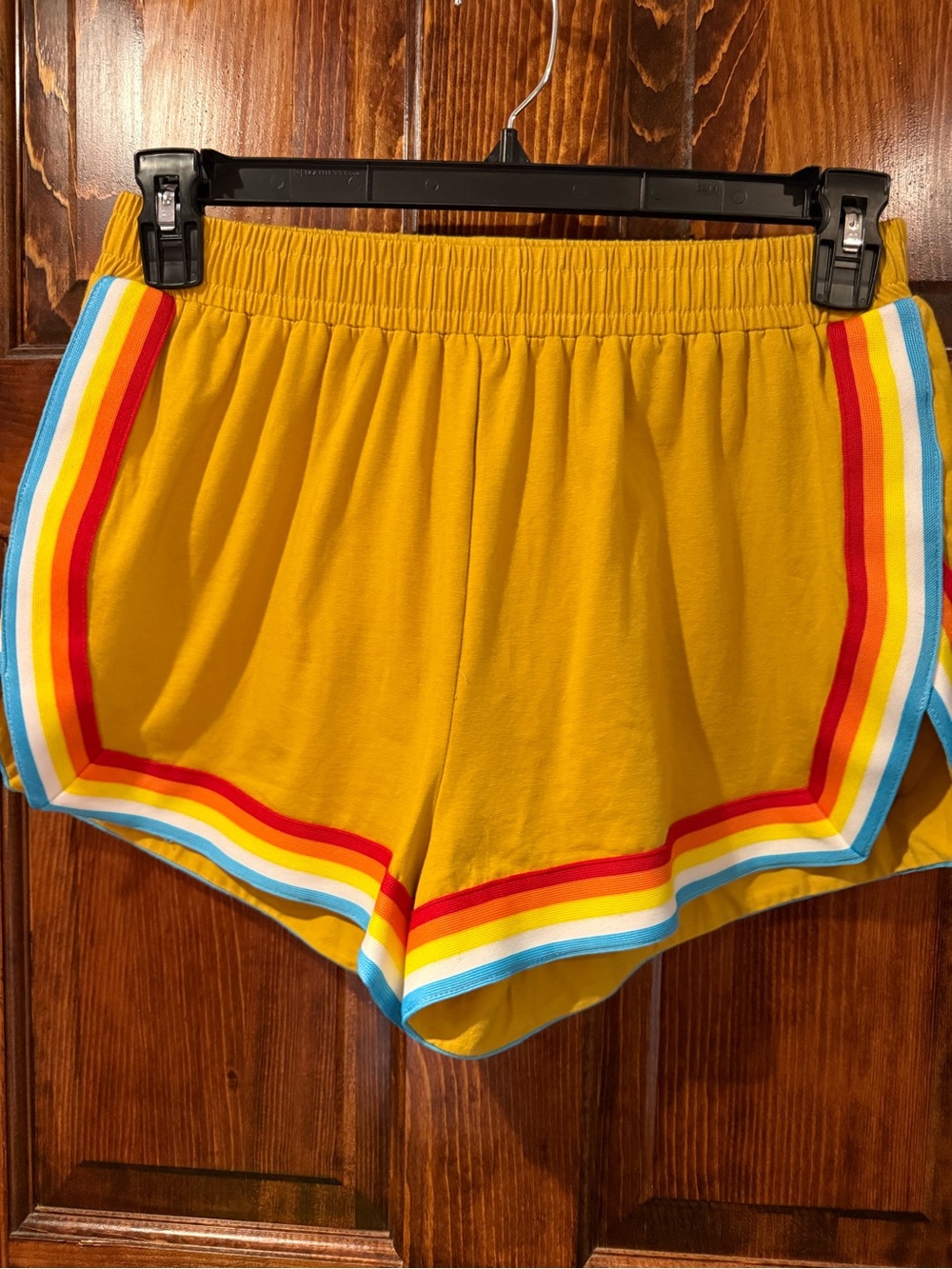 Vintage looking Women's Mustard Yellow Athletic Shorts with Rainbow Stripe Trim